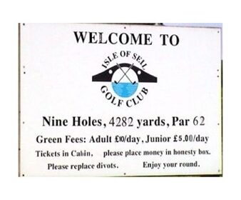 A sign that says welcome to isle of sea golf club.