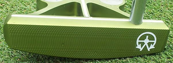 frogface A close up of the bottom of a green container.